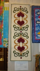 February Table was just one of the quilts my friend, the awesom appliquer Maryann Geiser showed.